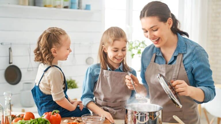 A mother baking in the kitchen with her kids